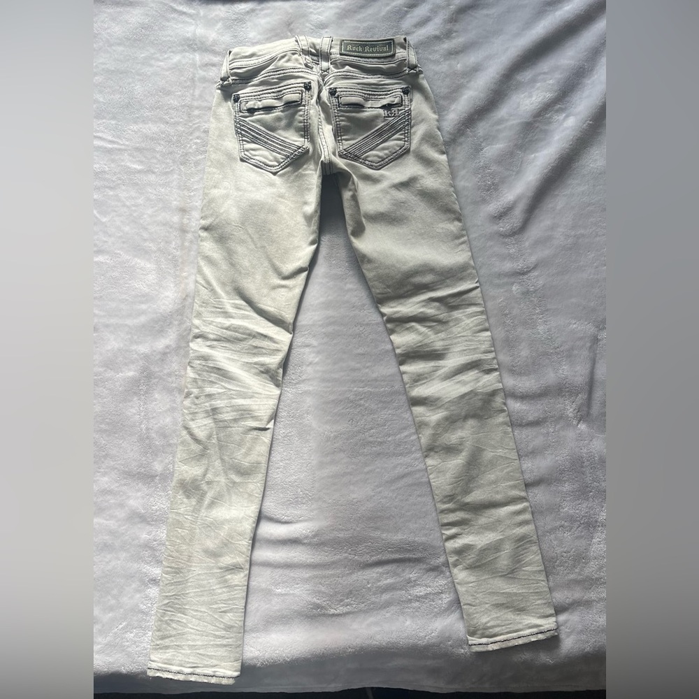 Rock Revival Size 25. 30 inseam. Skinny. Very small mark jeans by pocket.